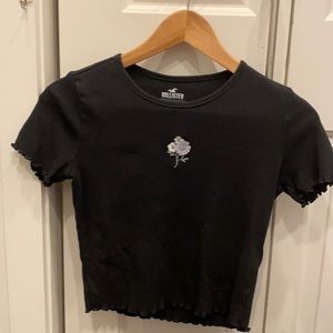 ruffled sleeves and bottom of shirt is also